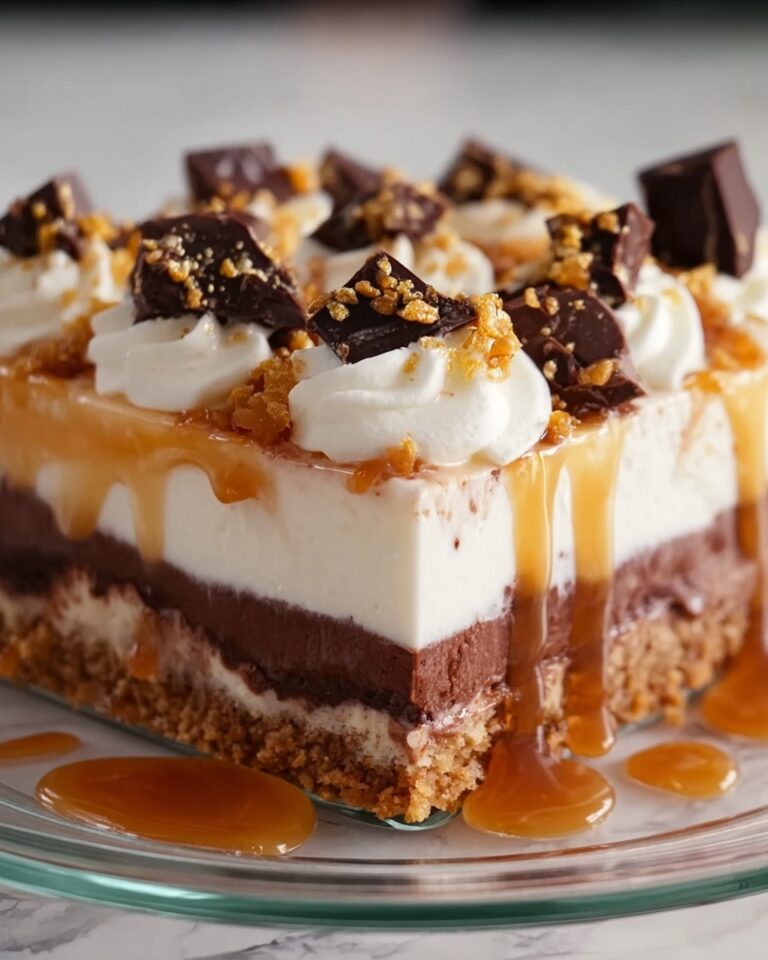 A Slice of Heaven Cake: Decadent Chocolate, Caramel, and Snickers Delight Recipe
