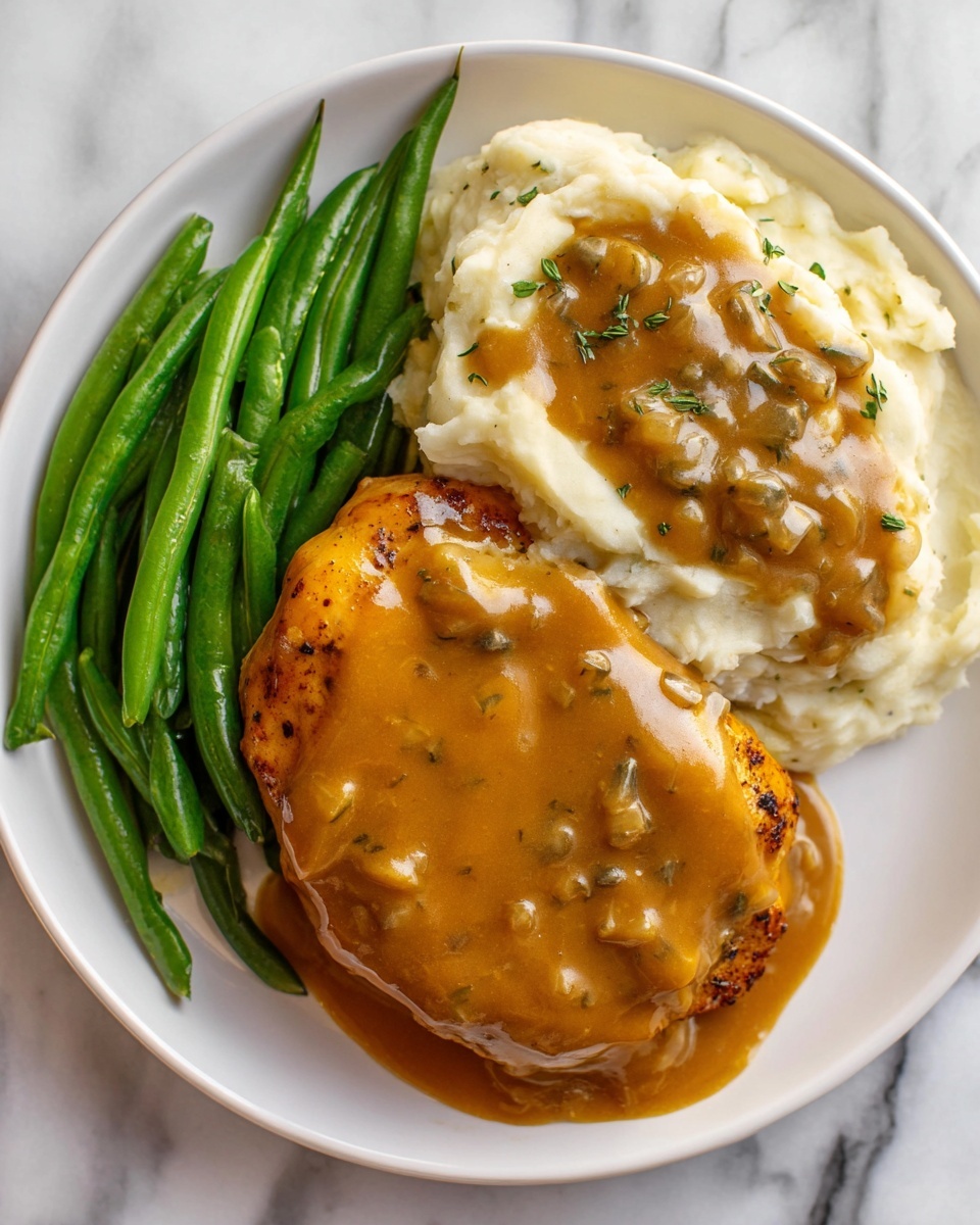 Smothered Chicken with Creamy Onion Gravy Recipe - Recipe Image