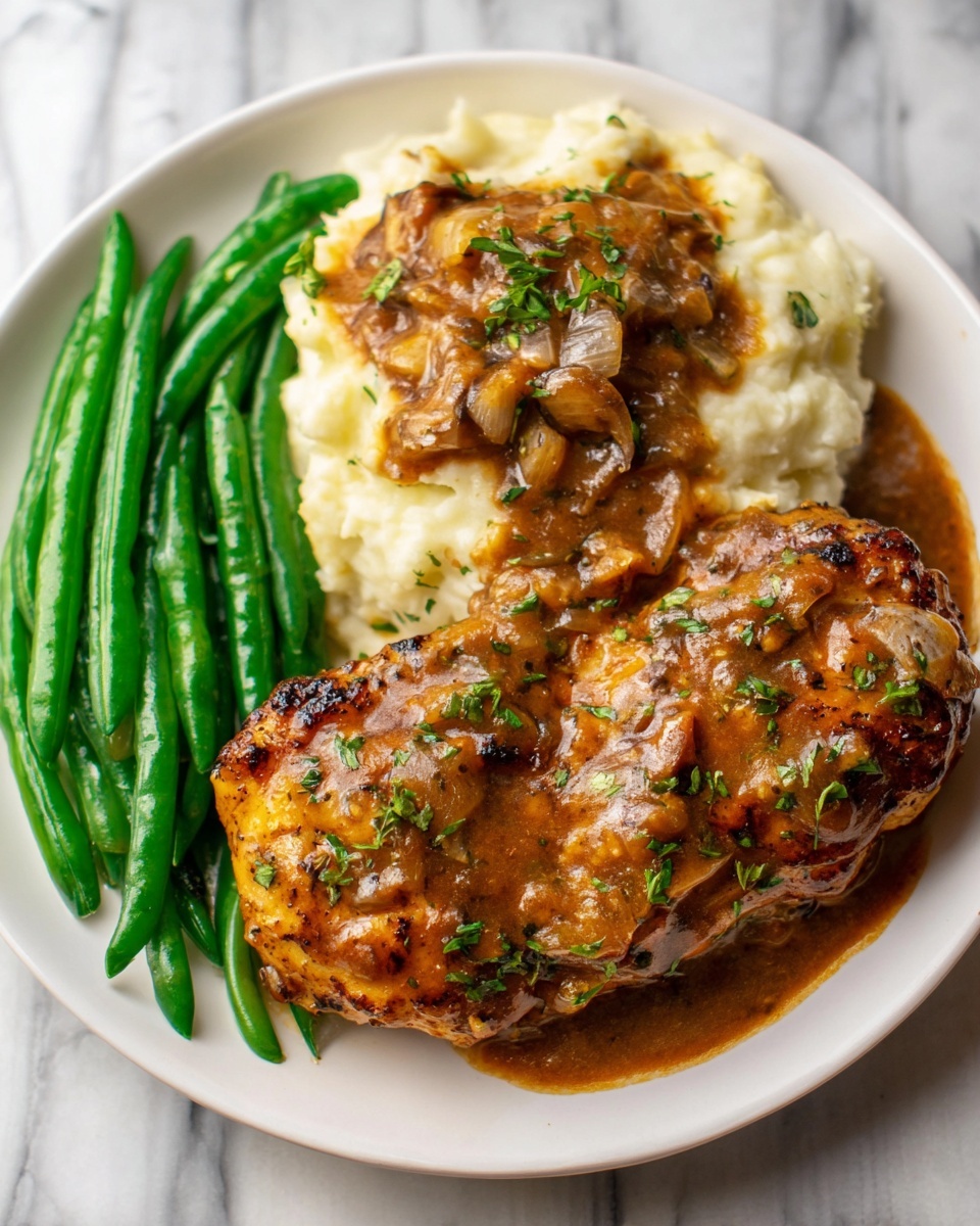 Smothered Chicken with Creamy Onion Gravy Recipe - Recipe Image