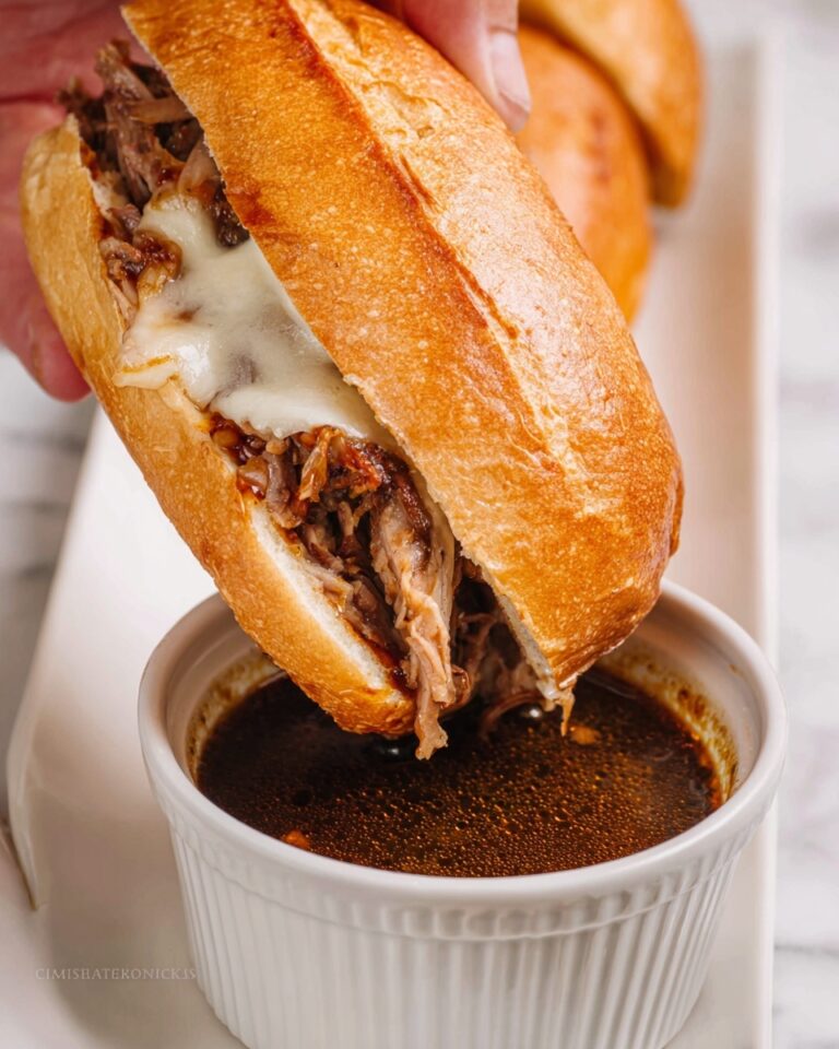 Slow Cooker Shredded Beef Sandwiches with Caramelized Onions and Melty Cheese Recipe