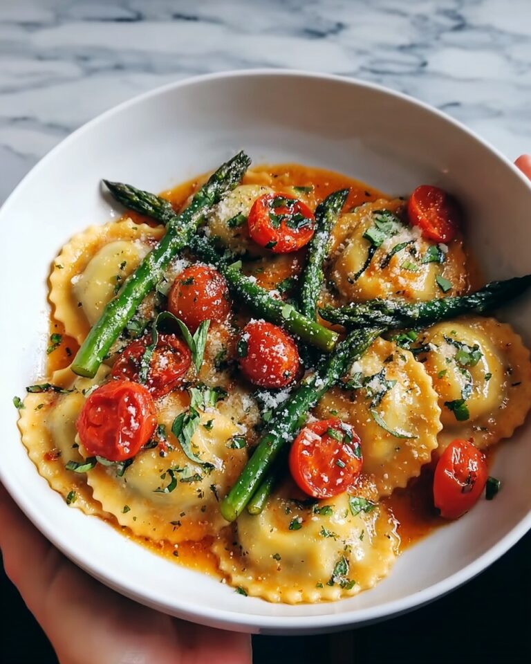 Elegant Ravioli with Tomatoes, Asparagus, Garlic, and Herbs for Effortless Dinners Recipe