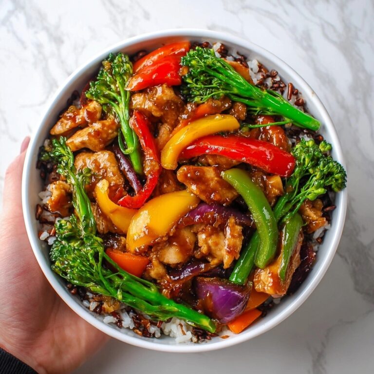Delicious Teriyaki Chicken Stir-Fry with Colorful Veggies and Wild Rice Recipe